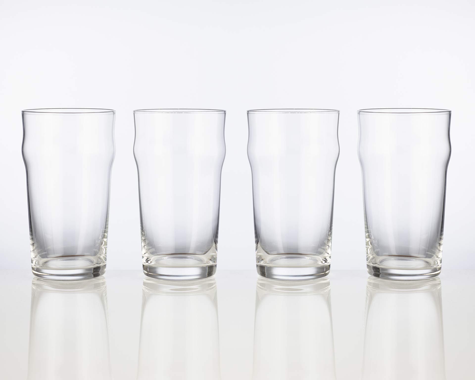 https://www.craftmastergrowlers.com/wp-content/uploads/2020/07/4-nonic-style-pub-glasses-white.jpg