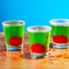 cherry bomb green shots with sugar rims in 1.75oz shot glasses.