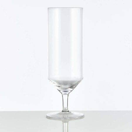 A 14 oz footed stange glass, empty on a white background.