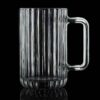 18oz faceted classic beer mugh with handle, backlit on a black background.