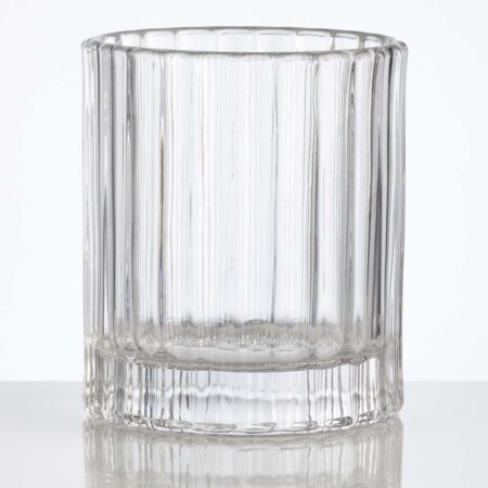 faceted double old fashioned glass that holds 11.5 ounces of bourbon or whiskey on a white background.