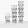 example of multiple 11.5 oz stackable rocks glasses in stacks of varying size.