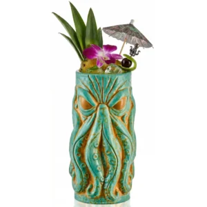 Heavy ceramic Kraken tiki mug with sculpted tentacles holding a craft cocktail